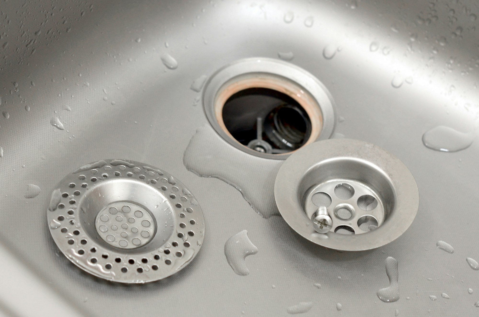 Kitchen sink plumbing repair in progress